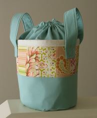 Round fabric basket with handles and drawstring top free sewing pattern