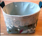 Lined round storage fabric basket with handles free sewing tutorial