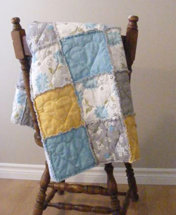 Baby rag quilt with heart stitching