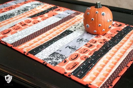 Halloween table runner pattern from jelly roll scraps