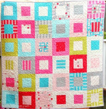 Modern quilt using charm squares