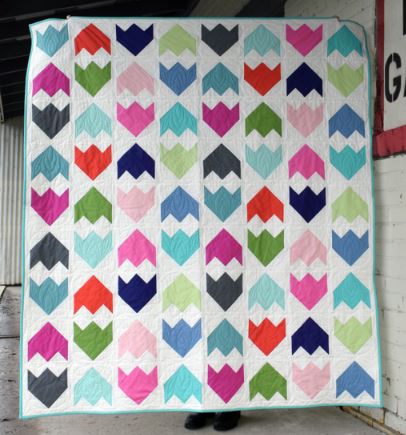 Modern fat quarter quilt pattern with tulip design